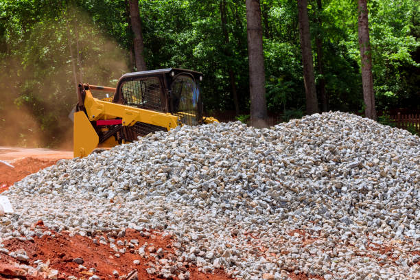istock Excavation at a construction site, mini loader bobcat transports crushed stone to different construction 1400843395