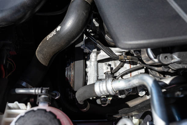 istock Air conditioning compressor in passenger car with diesel engine, located in the engine compartment. 1400844680