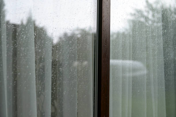 istock drops after the rain on the window glass 1400845699