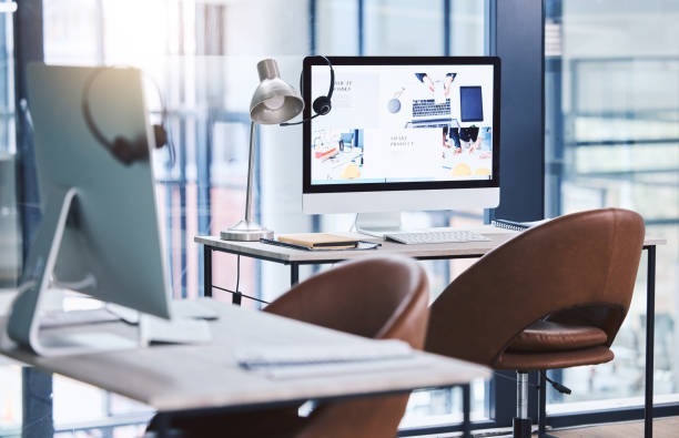 istock Webpage advert on computer desktop screen monitor in an empty call centre office. Operating helpdesk to consult and make sales on products and services to customers. Telemarketing agency providing online assistance and support 1400847667