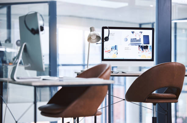 istock Webpage advert on computer desktop screen monitor in an empty call centre office. Operating helpdesk to consult and make sales on products and services to customers. Telemarketing agency providing online assistance and support 1400847672