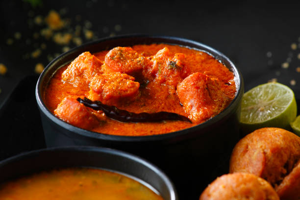 istock Rajasthani Dish Cusine Meal called Dal Baati Churma with Gatte ki Sabji 1400848726
