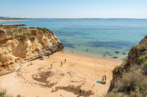Lagos, Portugal. 2022 May 06 . Panorama of the tourist Praia do Pinhao de Lagos in the Algarve, Portugal in the summer of 2022.