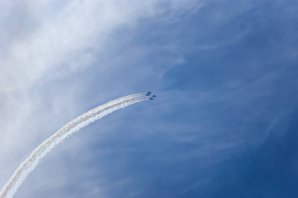 istock Flight of modern combat fighters on the sky background, Russia 1400849739