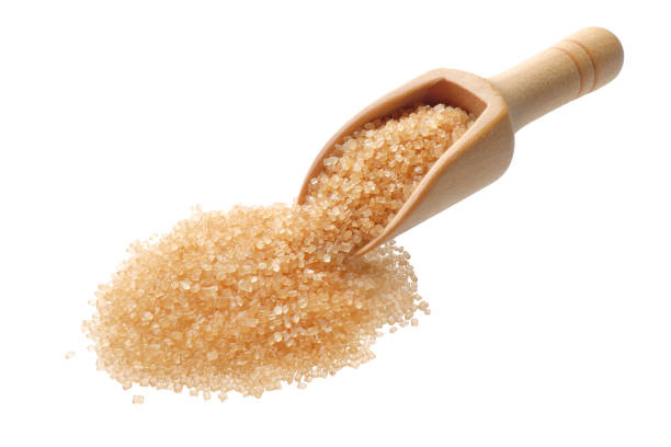 istock Cane sugar in a wooden scoop 1400852714