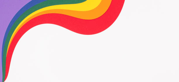istock Lgbtq colors flag paper layout on white background. Pride community. Rainbow colors layout background. Top view, copy space 1400854495