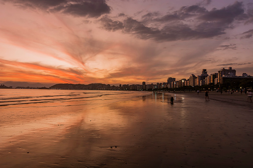 Santos city, Brazil. Sunset on the beachfront. Golden hour.