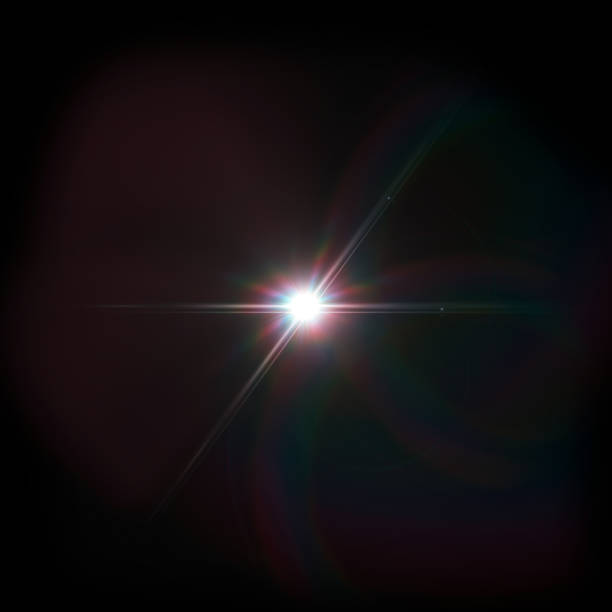 istock Lens flare with bright light isolated with a black background. 1400862377