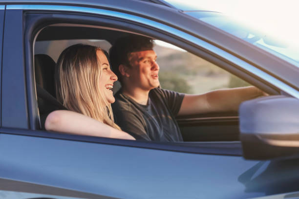istock Young couple in  a car road trip 1400863147