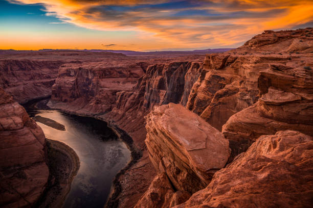 Horseshoe Bend Scenic view of Horseshoe Bend at Sunset near Page, Arizona. plateau photos stock pictures, royalty-free photos & images