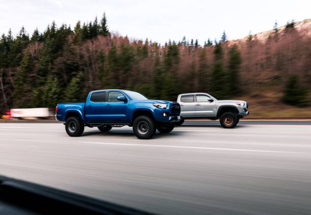 Toyota Tacoma North Bend, WA, USA
6/1/2022
Two Toyota Tacomas driving on the highway with trees in the background tacoma stock pictures, royalty-free photos & images