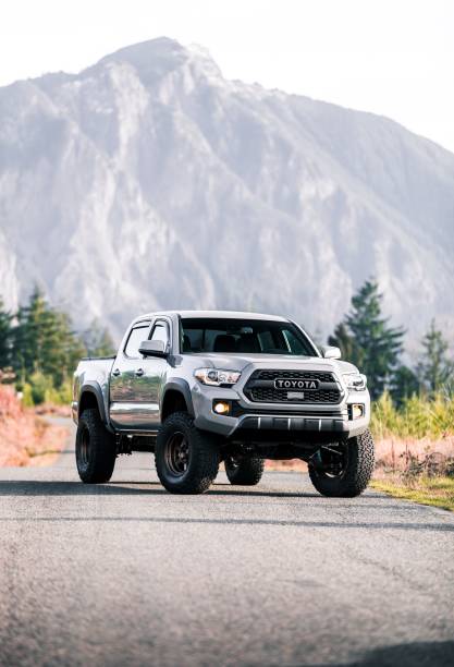 North Bend, WA, USA\n6/1/2022\nToyota Tacoma parked sideways with a mountain in the background