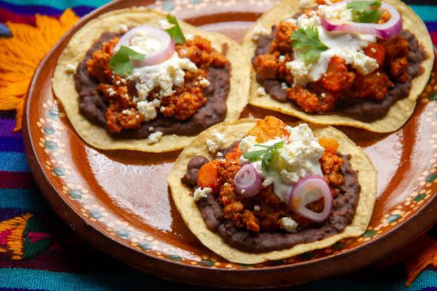 istock picadillo corn tostadas with cheese and beans. Mexican food 1400865593