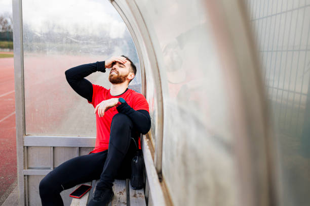 istock Tired man having pain during intensive work out 1400866734
