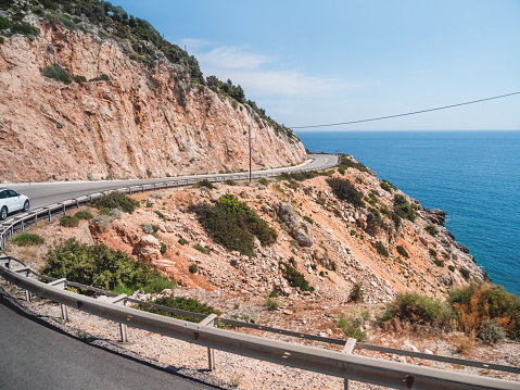 Mountain serpentine road along Mediterranean sea. Demre Finike Yolu (road). Turkey.