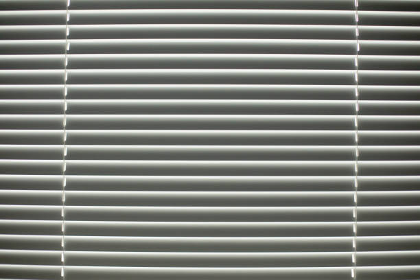 istock Blinds on window. Flaps for protection from light. Interior details. 1400871154