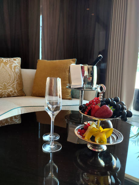 istock Champagne with Tropical summer fruits 1400874595