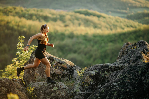 istock Strong woman running on mountain 1400879655