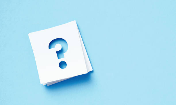 istock White Adhesive Notes With Cutout Question Mark Sitting Over Blue Background 1400879670