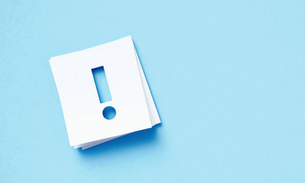 istock White Adhesive Notes With Cutout Exclamation Point Sitting Over Blue Background 1400880228