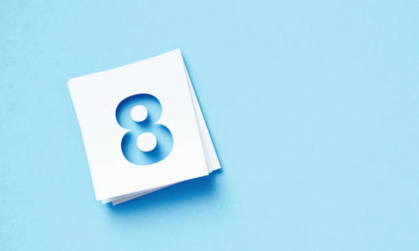 istock White Adhesive Notes With Cutout Number 8 Sitting Over Blue Background 1400880495
