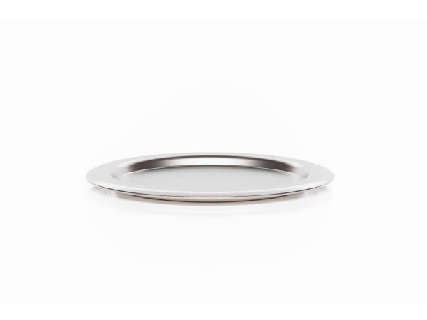 piatto d'argento seduto su sfondo bianco - serving tray silver plate foto e immagini stock
