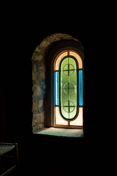istock Stained glass window of chapel closeup. 1400885547