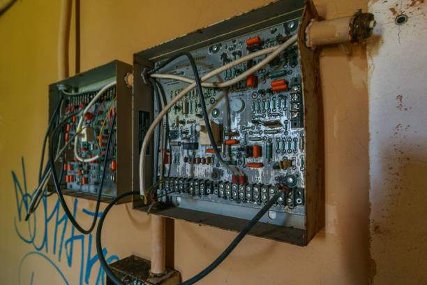 istock old destroyed electrical box with electrical components and wires in an abandoned industrial building 1400890312