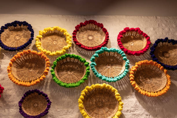 istock Handmade colorful baskets on a white wall 1400896674