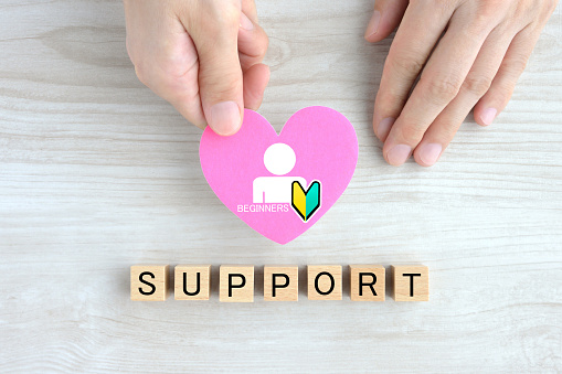 Heart object with beginner pictogram and wooden blocks with SUPPORT word