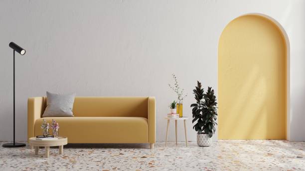 istock Yellow sofa with plant on white wall and Terrazzo flooring. 1400901139