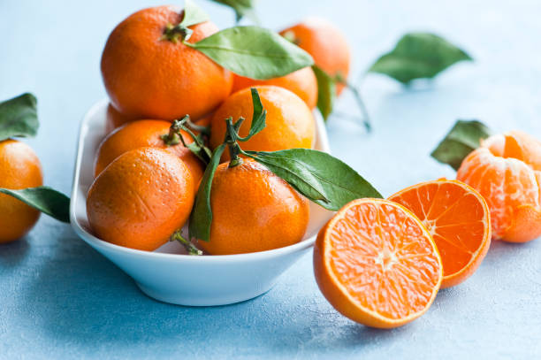 Oranges, Close up of Tangerines stock photo