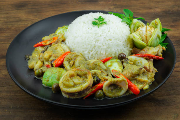 Squids with Green Curry Served Rice recipe Thaifood stock photo