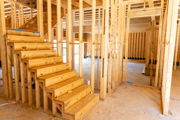 istock New house residential construction  framing with stairs. 1400916193