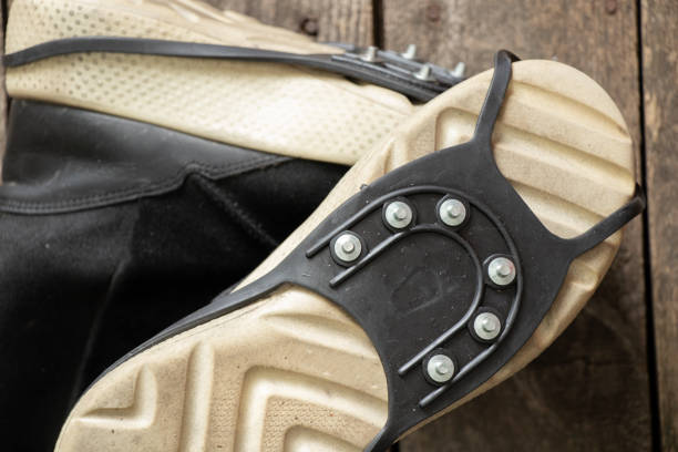 istock ice access on shoes, protection against slipping on ice 1400927179