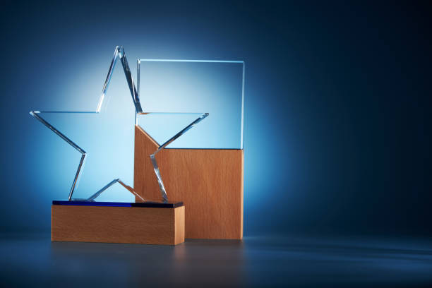 istock crystal star shape trophy against blue background 1400932876
