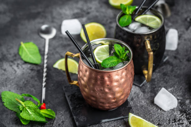 istock Cold Moscow Mules cocktail with ginger beer, vodka, lime 1400940016