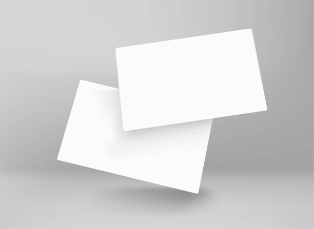istock Two blank white business cards in perspective. 3d vector mockup for branding 1400942424