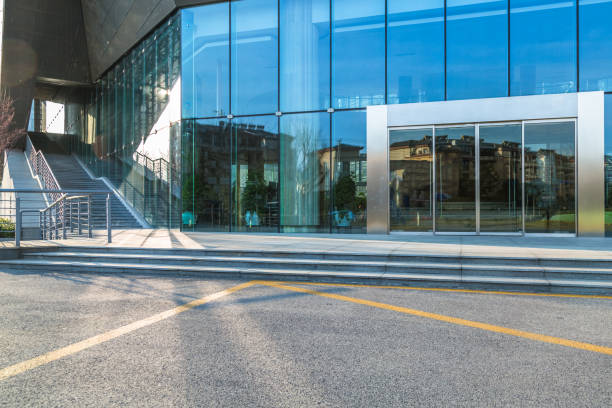istock empty asphalt road front of modern buildings 1400943977