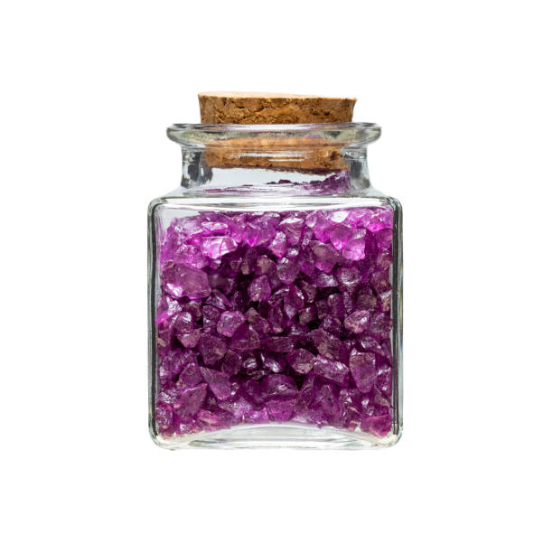 istock glass jar with decorative stones inside, isolated white background 1400947375