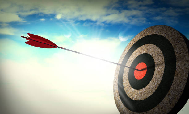 Target hit in the center, Arrow in the center of the target, successful. Target hit in the center, Arrow in the center of the target, successful. bulls eye photos stock pictures, royalty-free photos & images