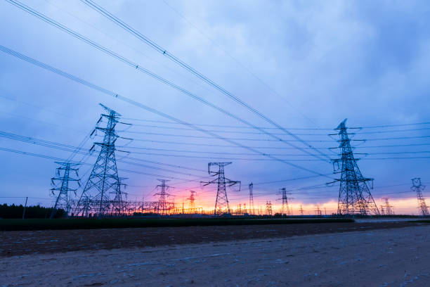 istock Pylons, high voltage pylons in the evening 1400956786