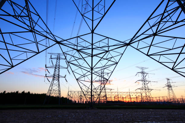 istock Pylons, high voltage pylons in the evening 1400956789