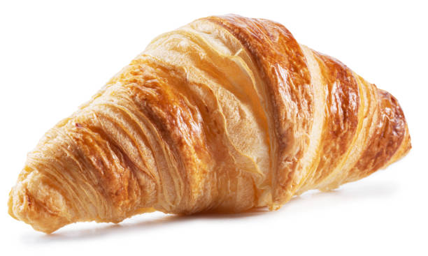 istock Tasty crusty croissant close-up on a white background. 1400956823