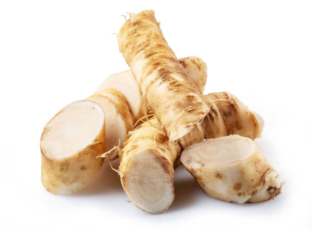 istock Horseradish roots close up isolated on white background. 1400957198
