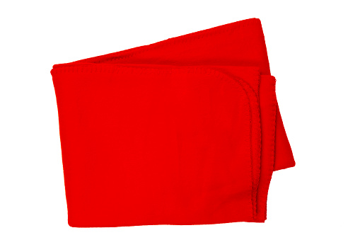 Folded red blanket on white background, clipping path. Top view. File contains clipping path.