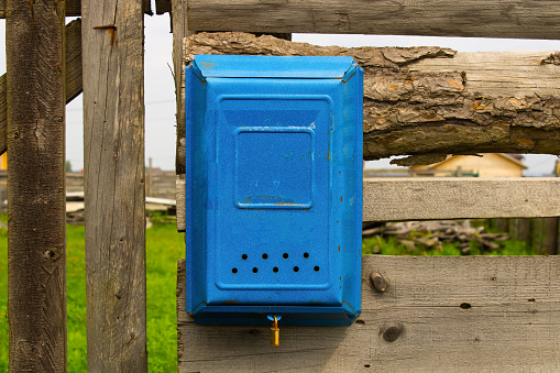 Close-up view of mail box on metal old door,  Galicia, Spain. Copy space on the upper part of the image.