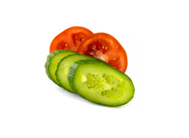 istock sliced red tomatoes and green cucumbers 1400961423