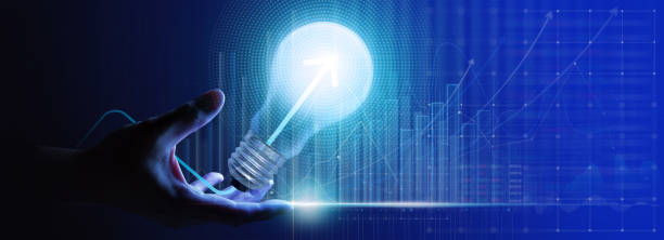 Businessman hand trowing creative light bulb with marketing graph icons on planning strategy, Modern business,analysis solution and development,Innovative of new ideas. stock photo