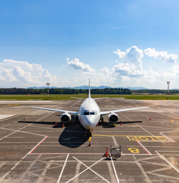 istock Airplane in Airport 1400966357